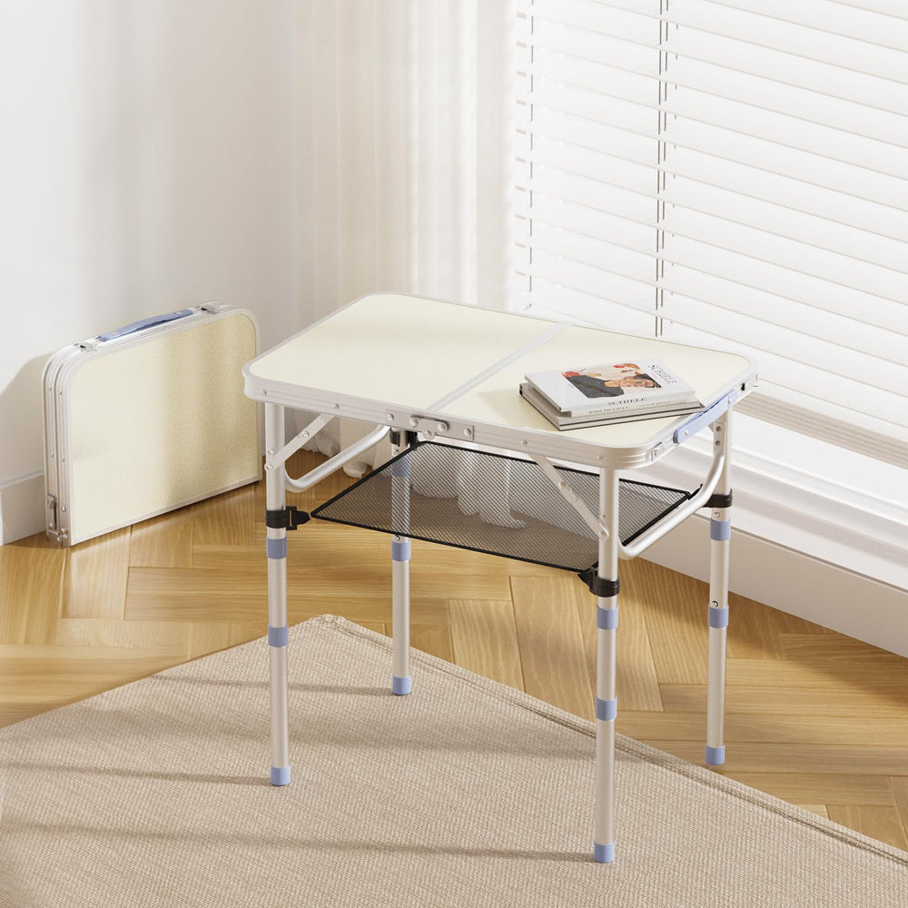 VINGLI folding table folded with carry handle for easy portability.