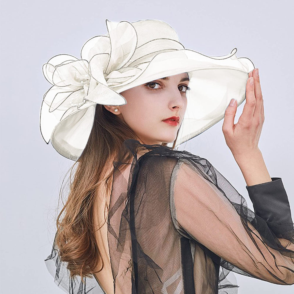 Side view of the flower accent on vintage cloche hat.