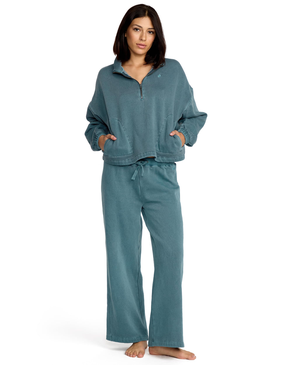 Volcom Stone Soft Quarter Zip fleece Emerald Green chest embroidery highlights branding.