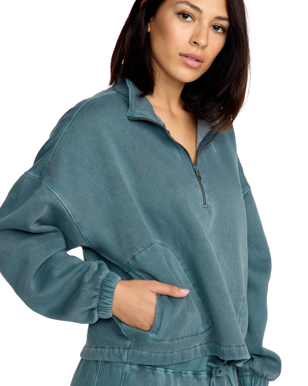 Volcom Stone Soft Quarter Zip fleece Emerald Green side pocket view adds everyday practicality.