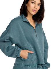 Volcom Stone Soft Quarter Zip fleece Emerald Green side pocket view adds everyday practicality.
