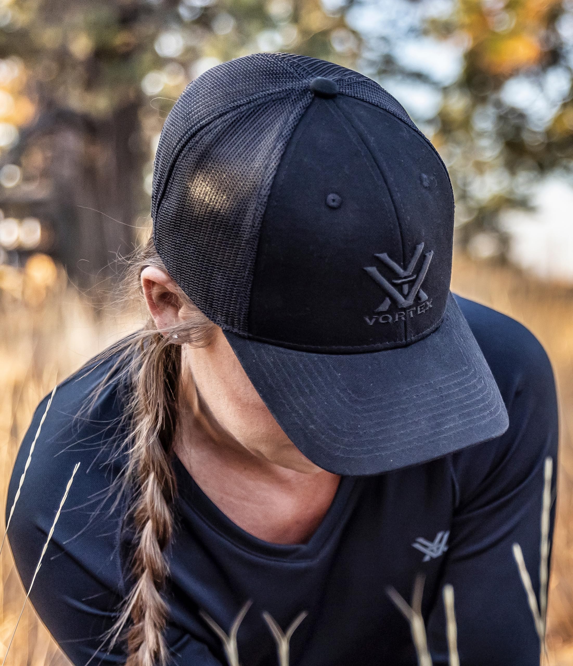 Vortex Core Logo Caps Black worn on head for outdoor and street style.