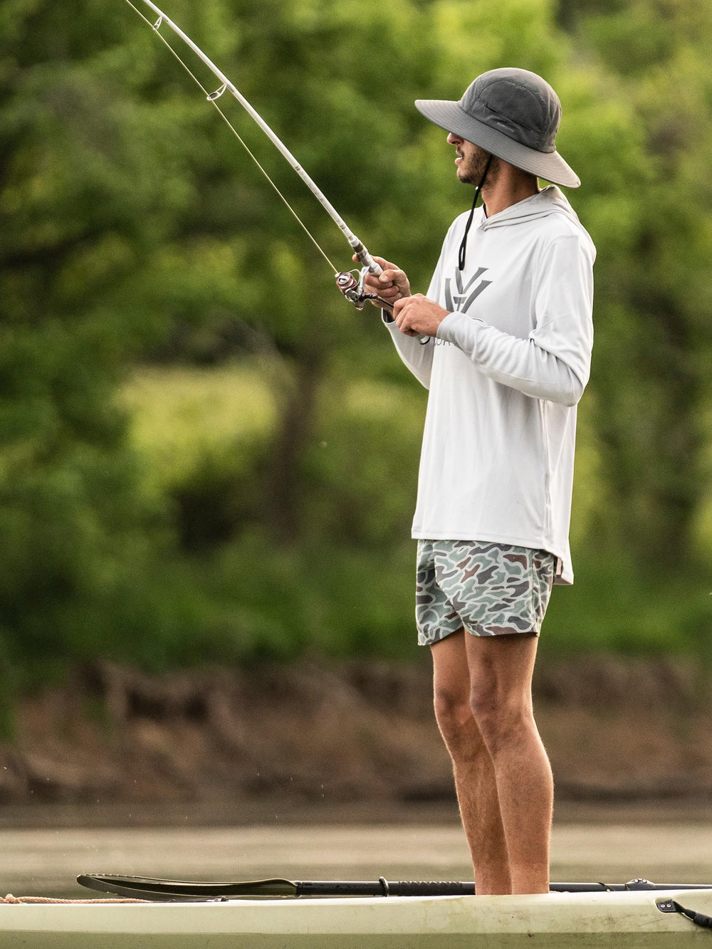 Vortex Sun Slayer Boonie Hat worn on a hiker, lightweight and breathable for outdoors