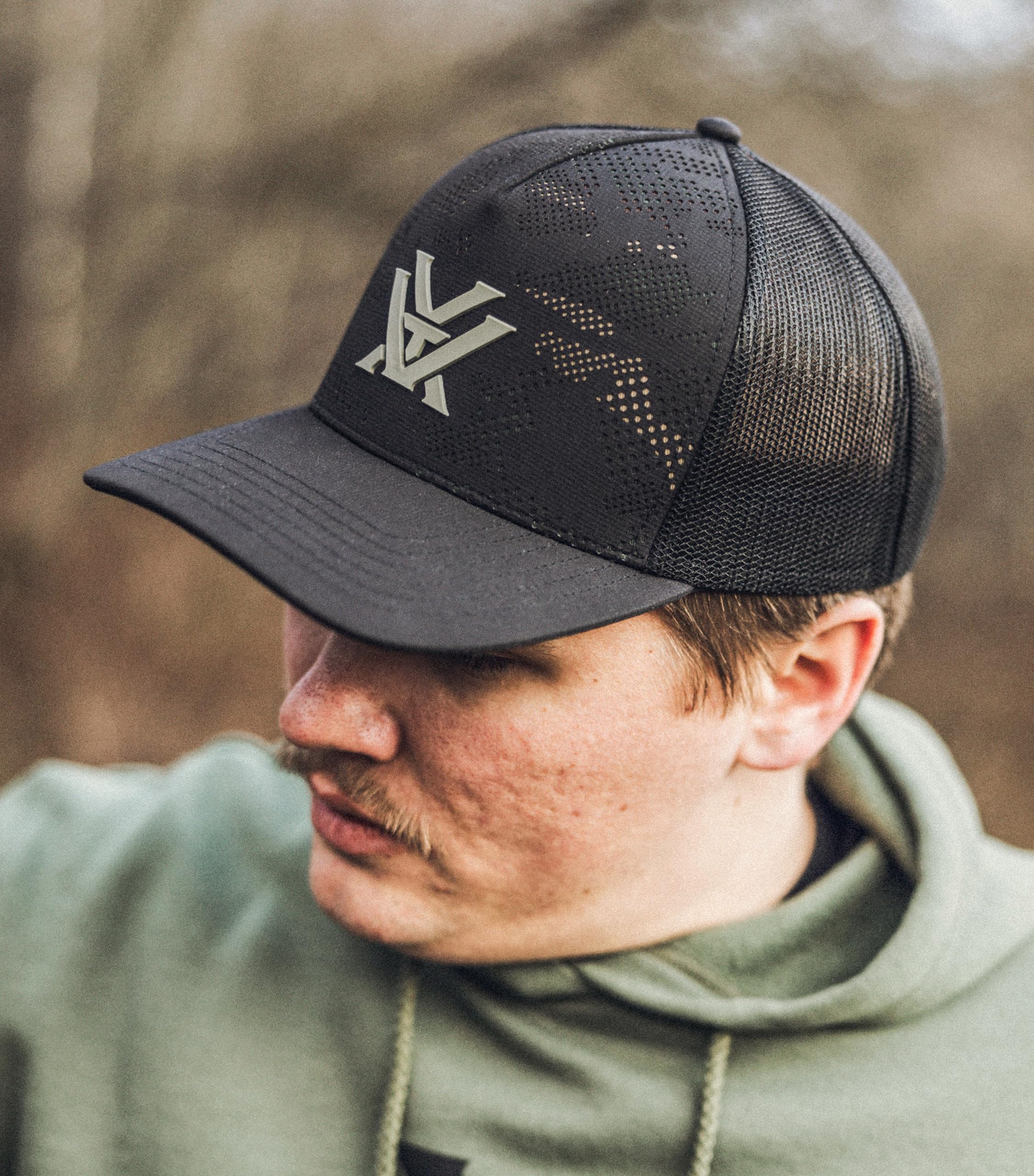 Structured crown and mesh back deliver a secure, casual fit.
