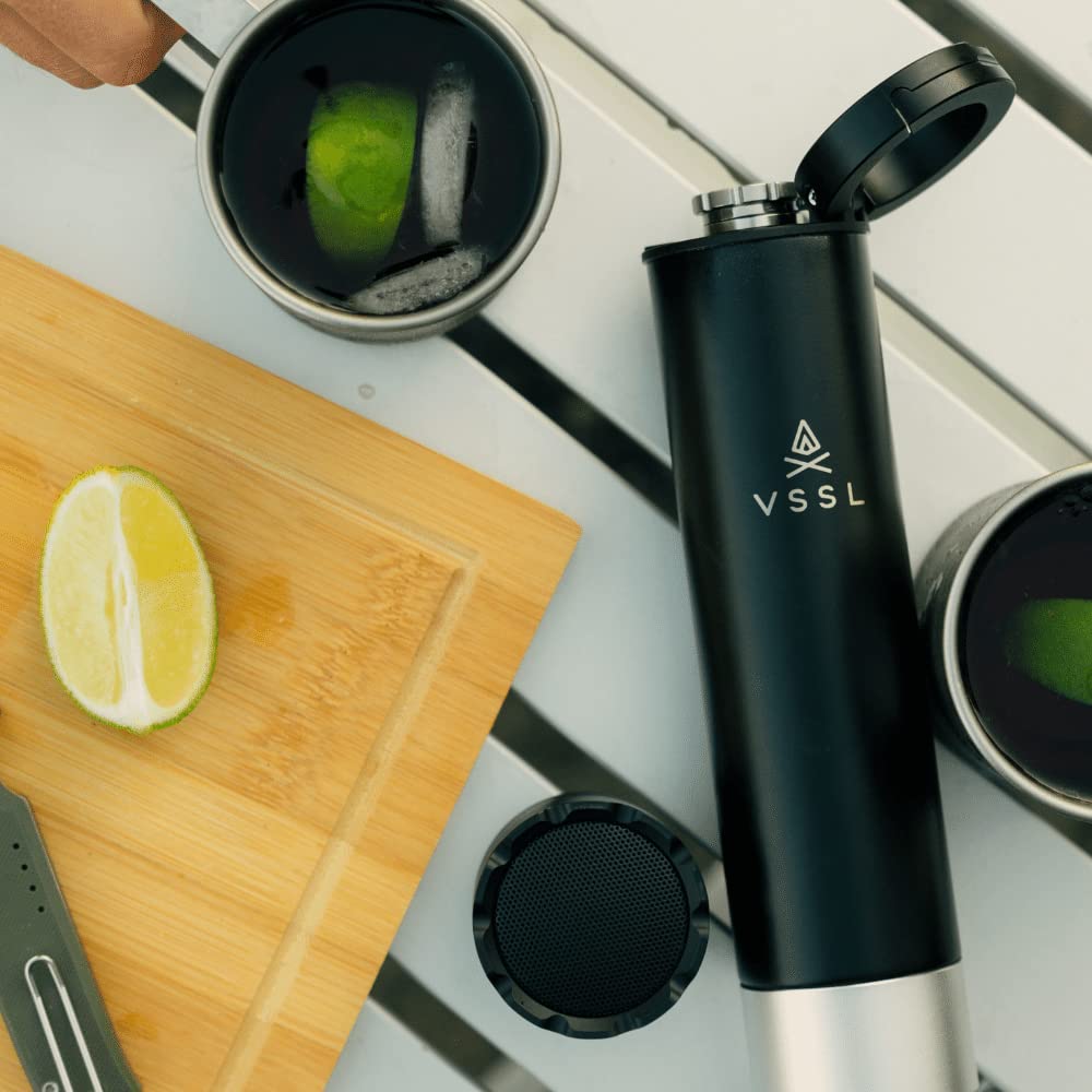 VSSL outdoor-use scene with flask and speaker for versatile adventures.