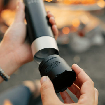VSSL USB-C charging cable connected to the flask for easy recharging.