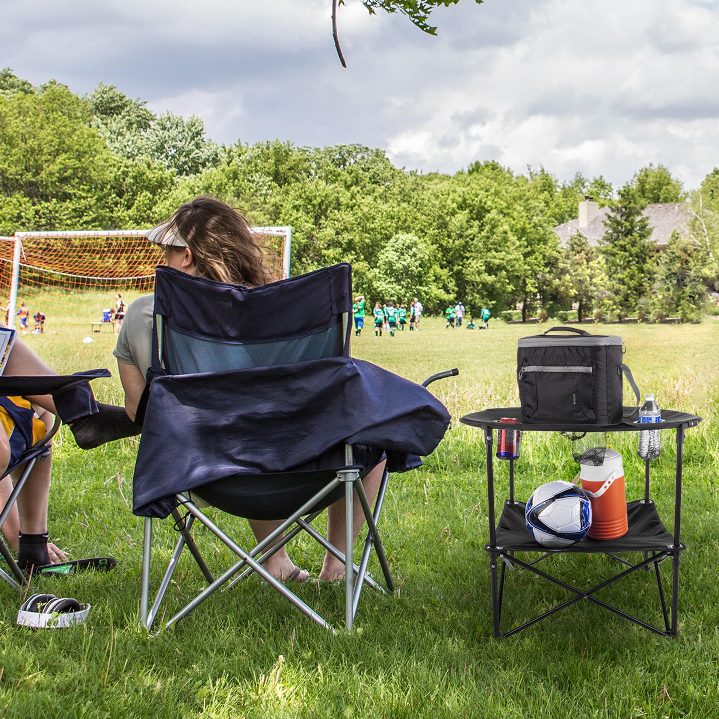 Wakeman Camping Table at tailgate with snacks and cups ready
