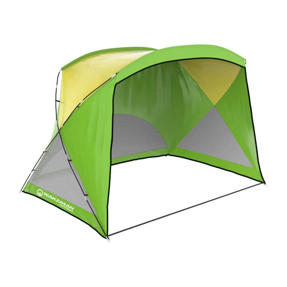 Wakeman Outdoors Beach Tent Sun Shelter UV protection shielding family on the beach.