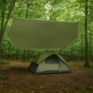 Wakeman Outdoors blue camping tarp in use as shelter over campsite