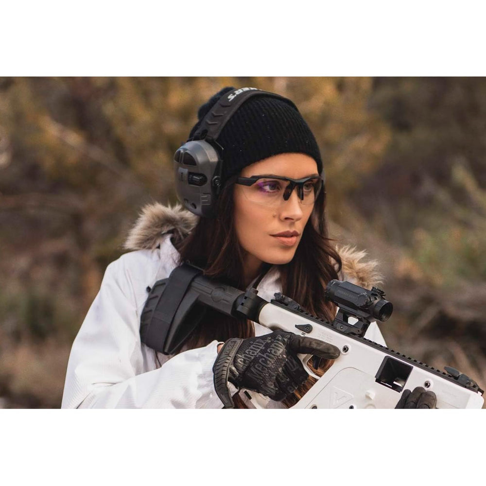 Walker's Ultimate Power Muff in use at the range demonstrating hearing enhancement and protection.