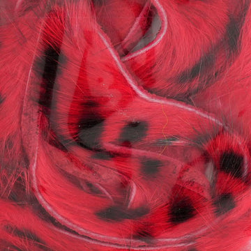 Wapsi Barred Rabbit Zonker Strips red close-up, showing texture for fly tying.