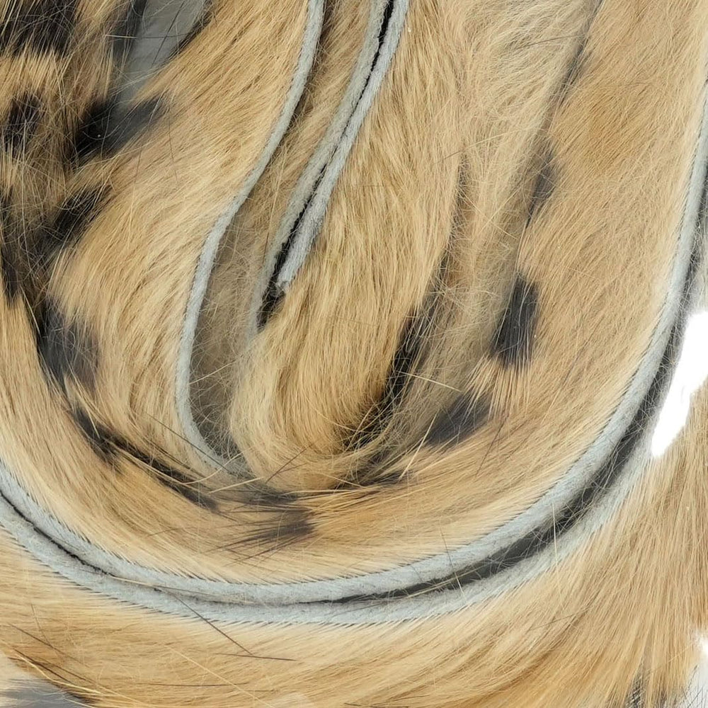 Wapsi Barred Rabbit Zonker Strips in tan, precisely cut to size for consistent flies.