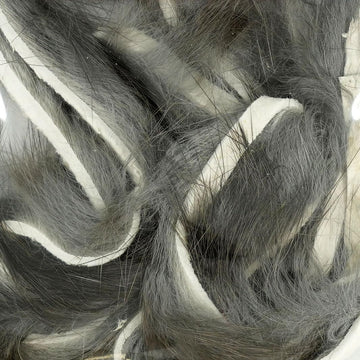 Wapsi Rabbit Fur Zonker tail focus highlights versatile streamer material for patterns.