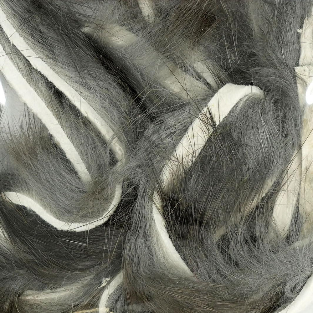 Wapsi Rabbit Fur Zonker tail focus highlights versatile streamer material for patterns.