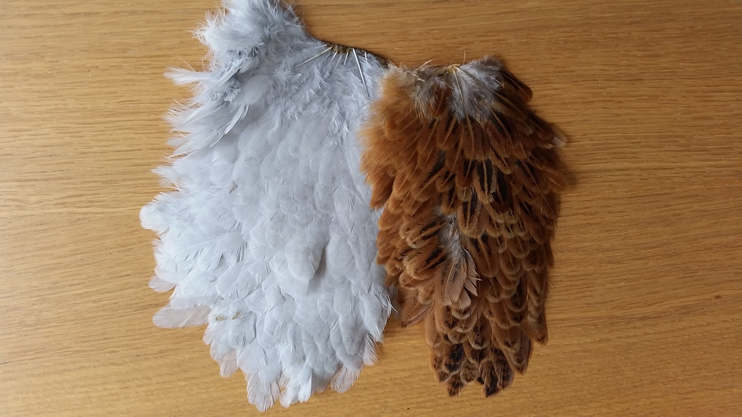 Wapsi Soft Hen Hackle Saddle Patch Ginger for nymph collars and tails.