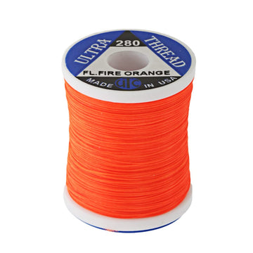 UTC Ultra Thread fluorescent fire orange spool; high visibility and strong grip for durable flies.