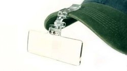 Wapsi Flip-Focal 2.25 magnifier clipped to a hat brim for fly tying