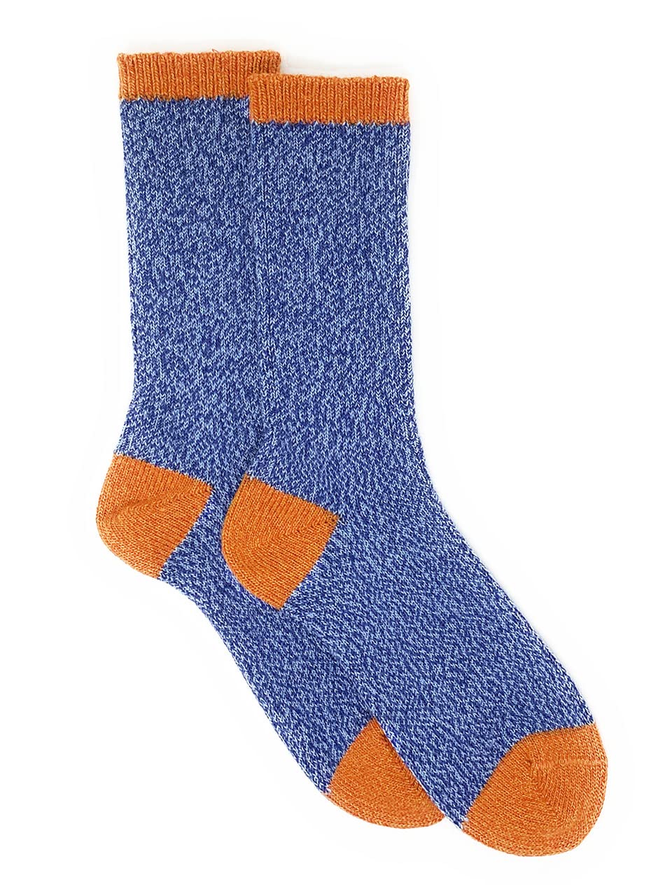 Warrior Alpaca Socks worn with boots or sandals for versatile comfort.