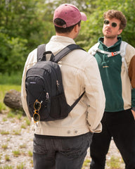 Waterfly 12L backpack side pocket view for quick-access essentials