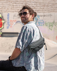 Waterfly lightweight small fanny pack side view highlighting slim profile for easy everyday carry.