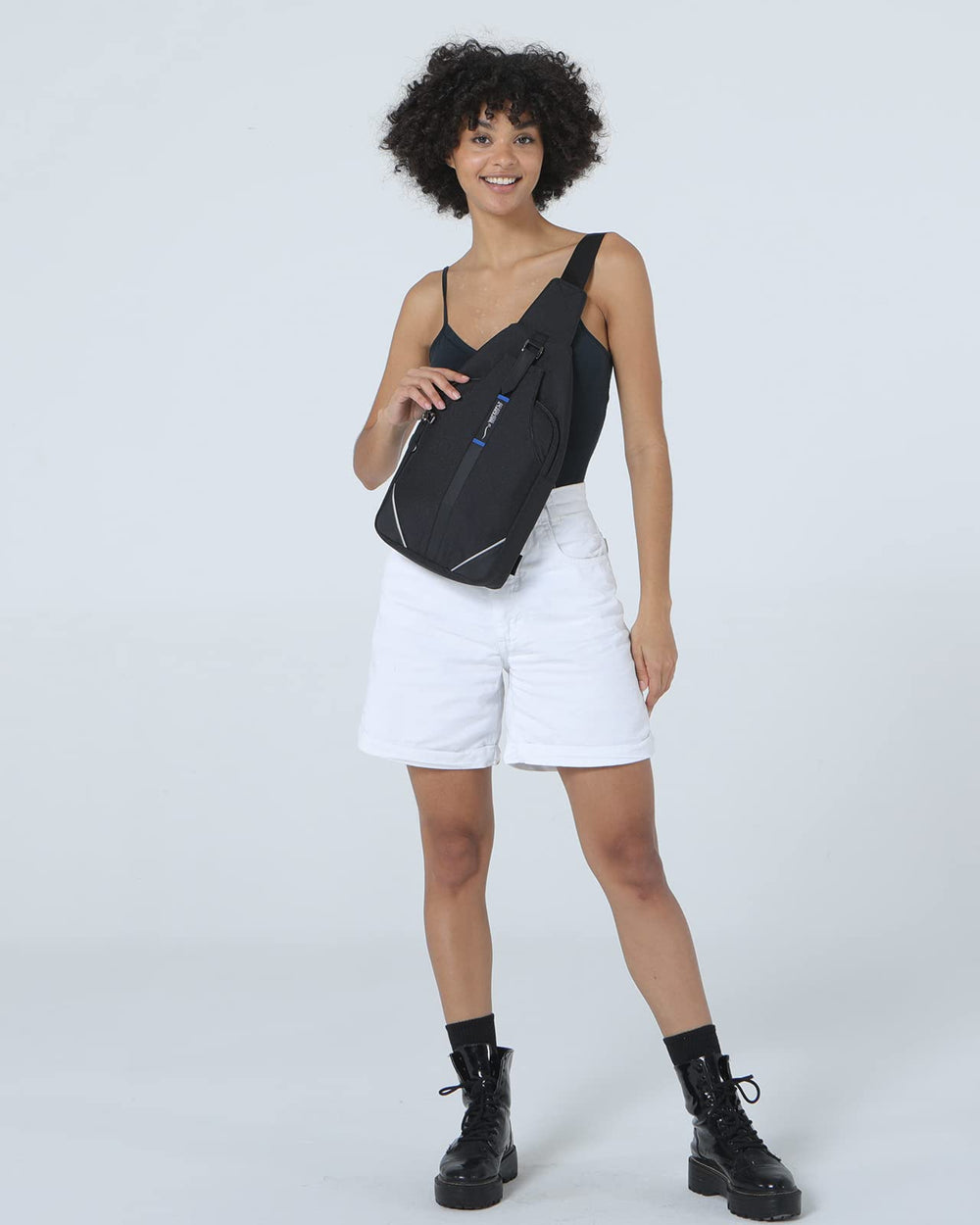 Waterfly compact-size bag pictured during daily outings fits tablet and power bank