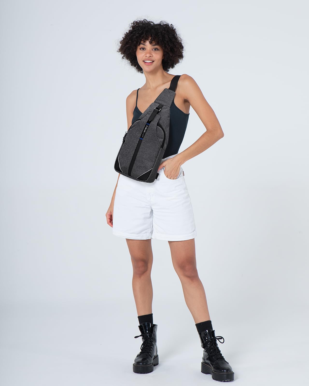 Waterfly medium crossbody sling backpack cotton linen close-up texture.