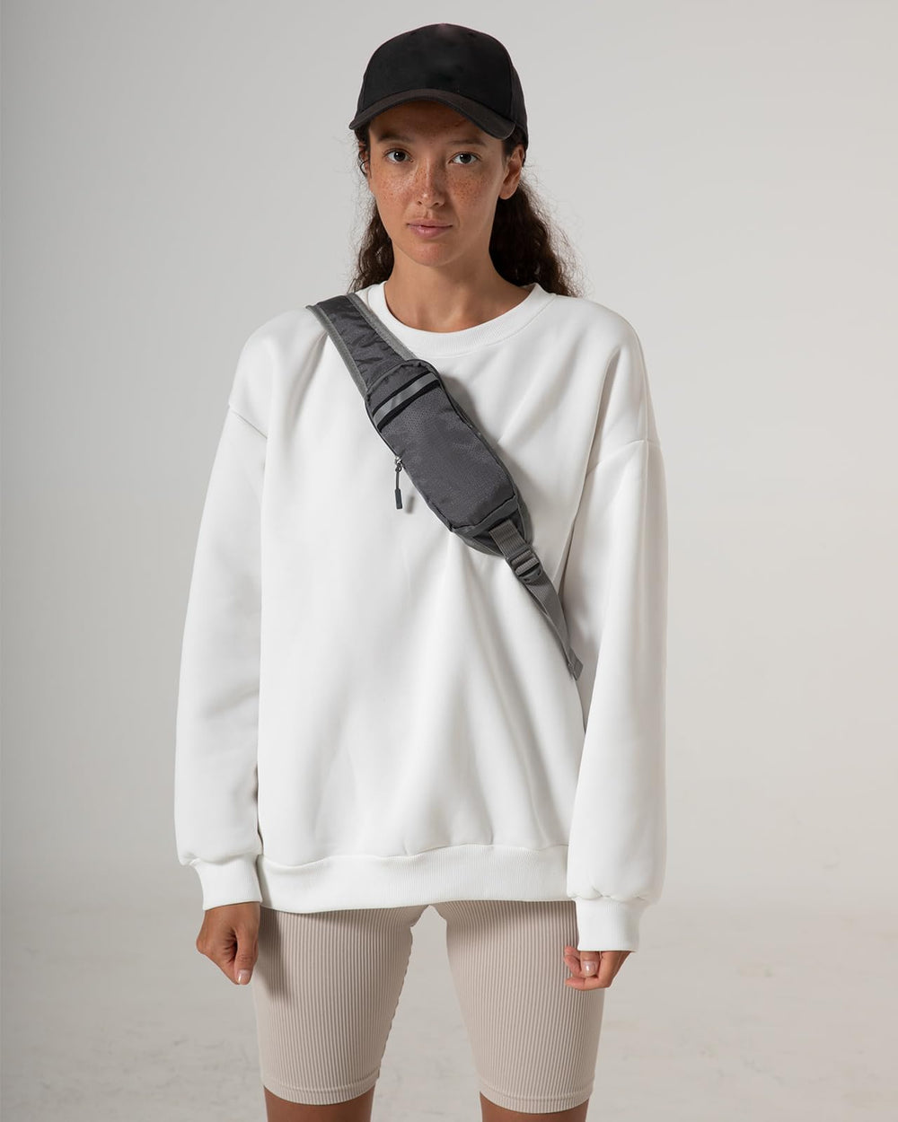 Waterfly Packable Sling Bag travel-use image highlights lightweight portability for weekend trips.