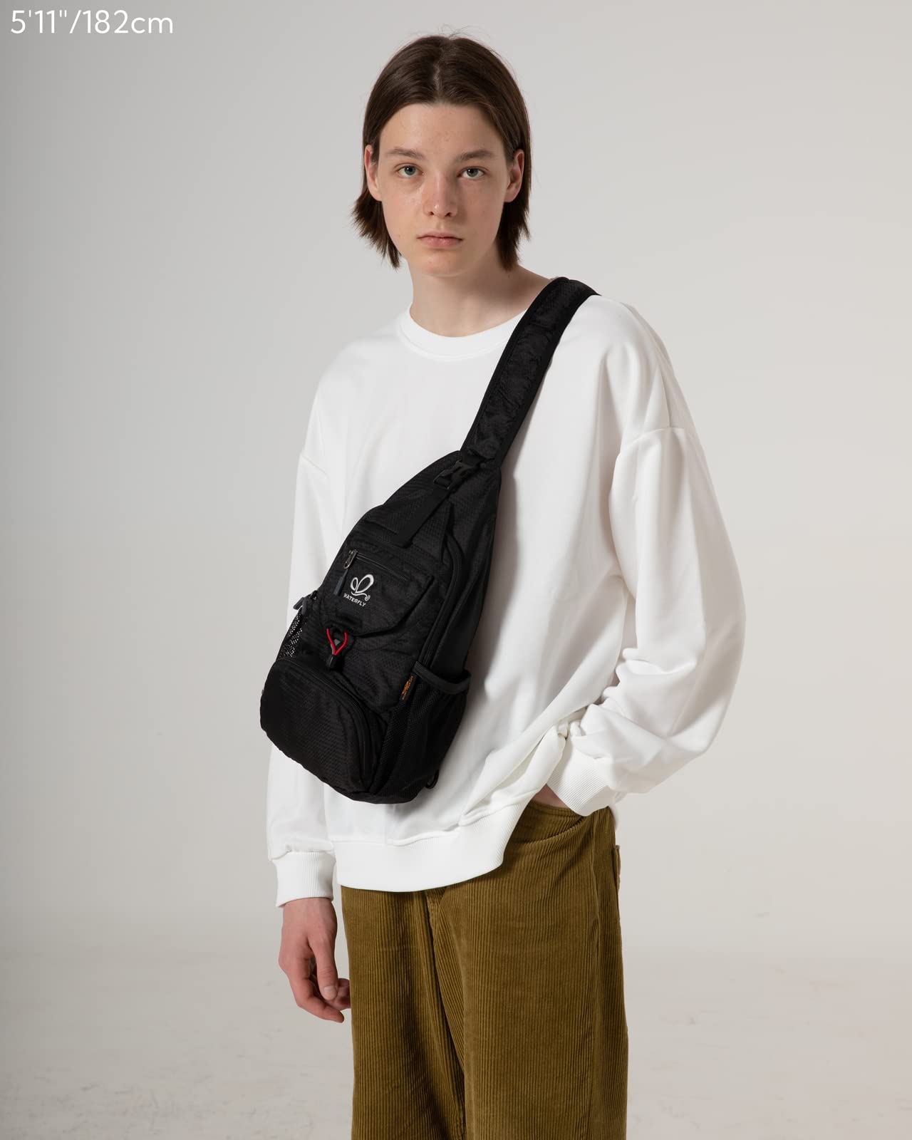 Waterfly packable crossbody bag folded pouch highlights easy packing and travel-ready convenience.