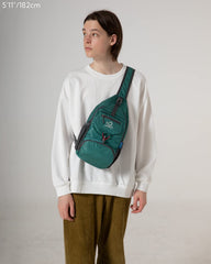 WATERFLY packable crossbody in folded compact form for travel convenience