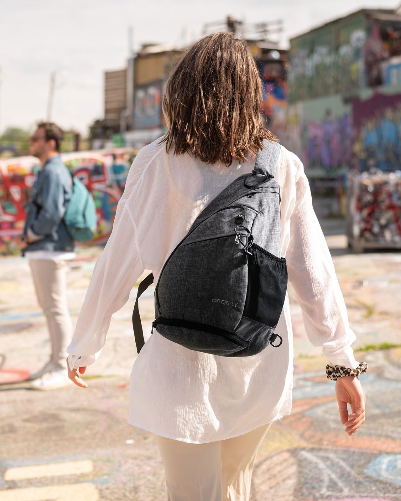 Waterfly sling bag breathable back padding adds comfort during long days.