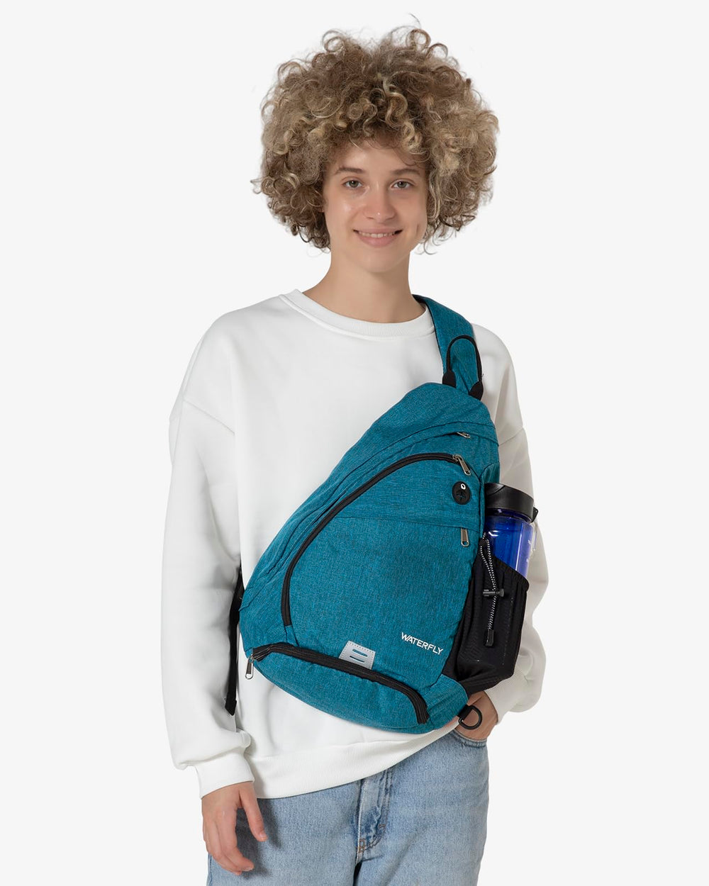 Waterfly sling bag earphone hole enables hands-free music or calls
