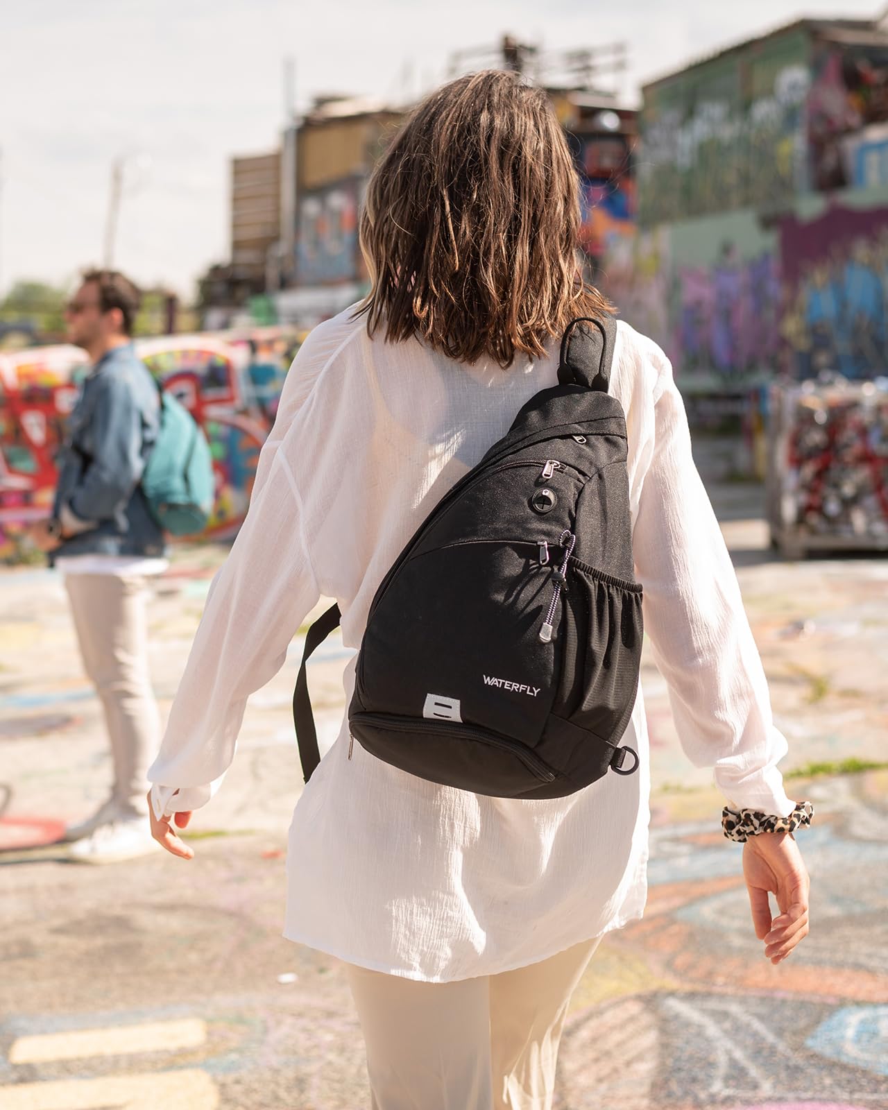 Waterfly Sling Bag water-repellent linen material resists moisture and abrasion.