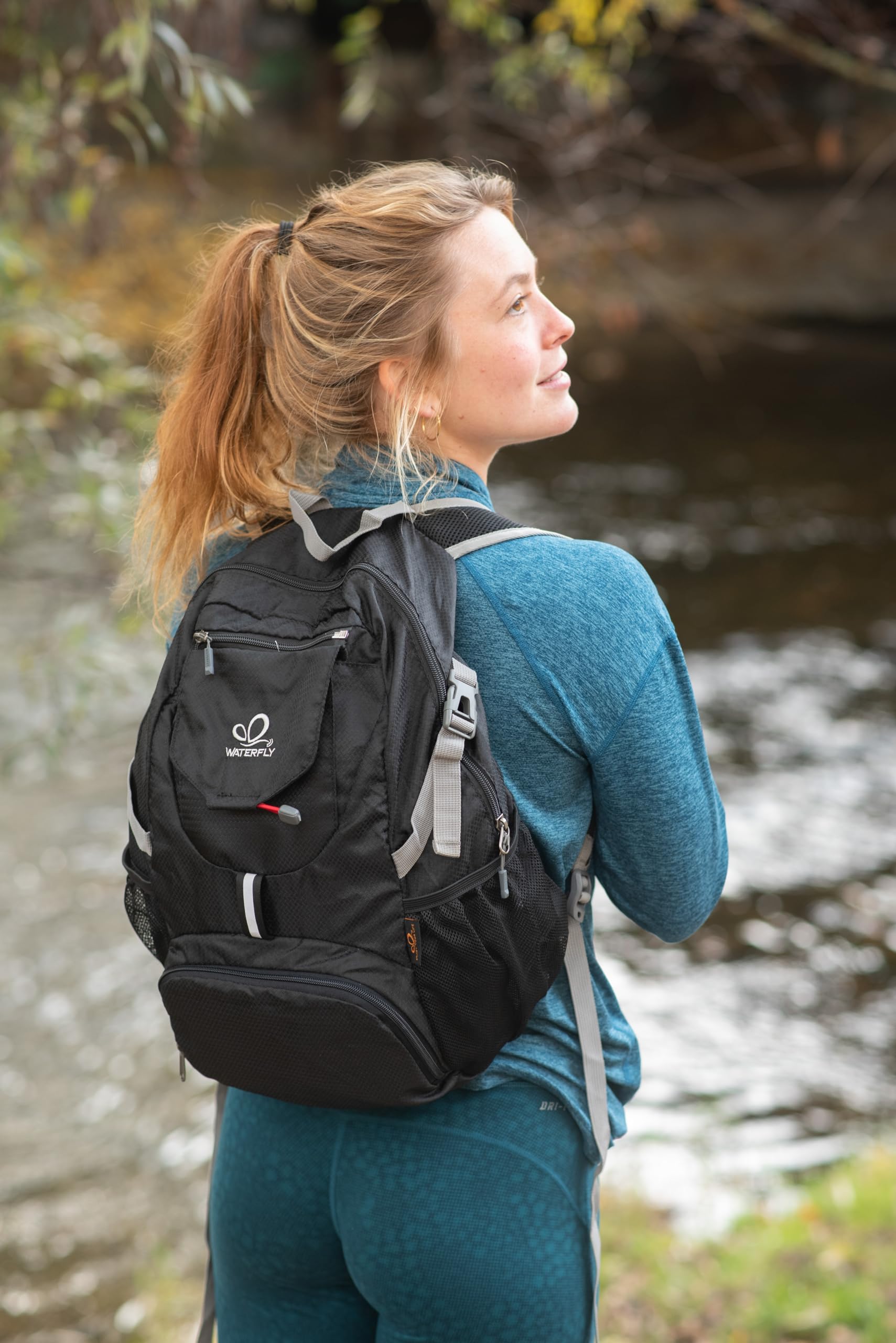 Waterfly ultralight backpack unfolded showing 20L capacity for day trips.