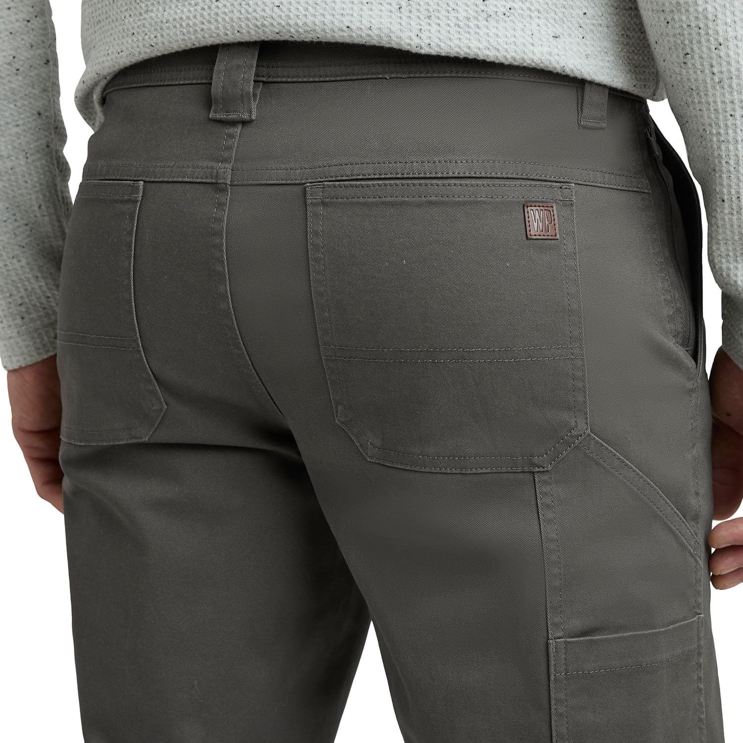 Weatherproof utility pants back pockets designed for safe item storage