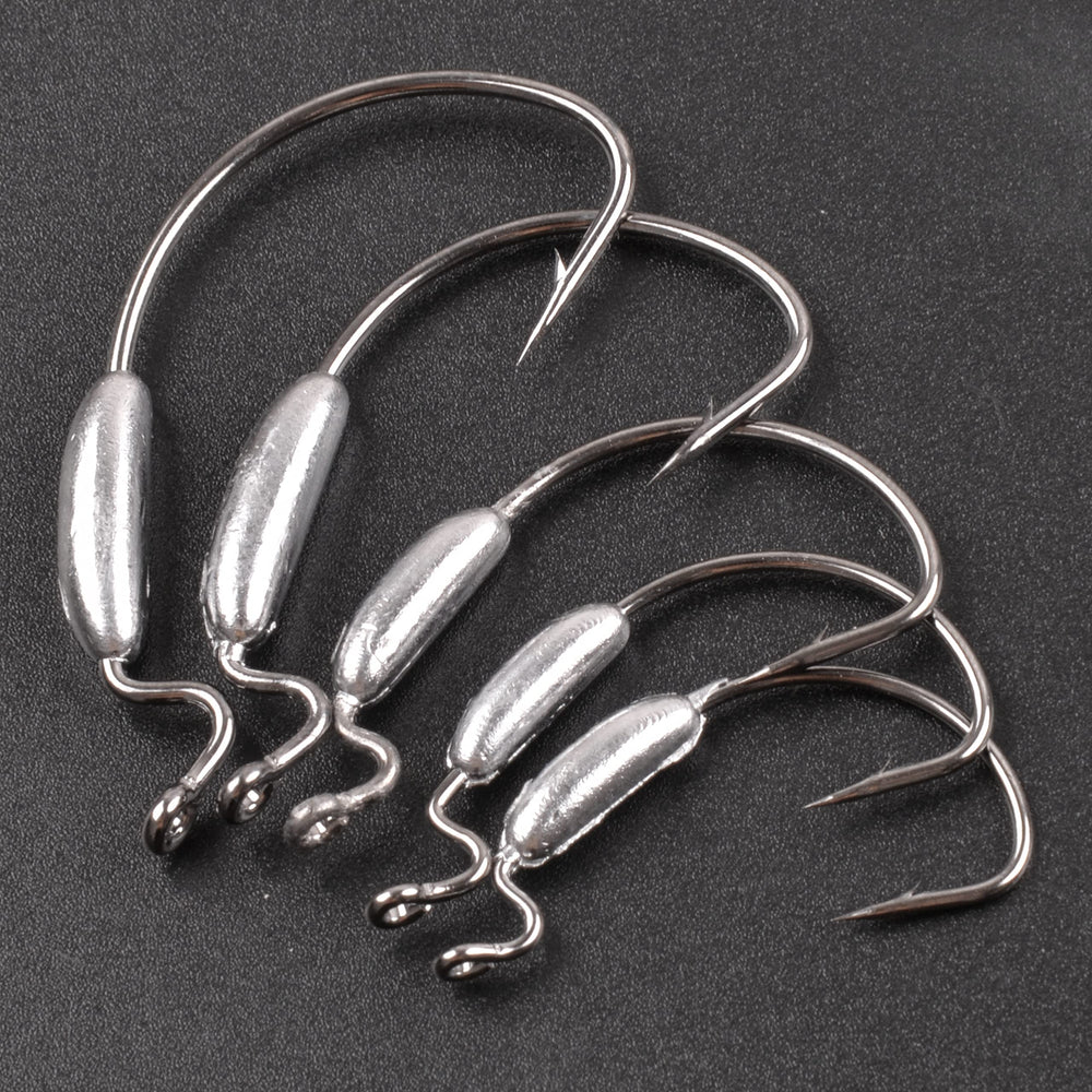 Angler rigging soft plastic worm on a weighted hook