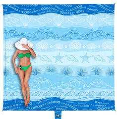 WEKAPO beach blanket 8x7ft laid out for ample family picnic space.