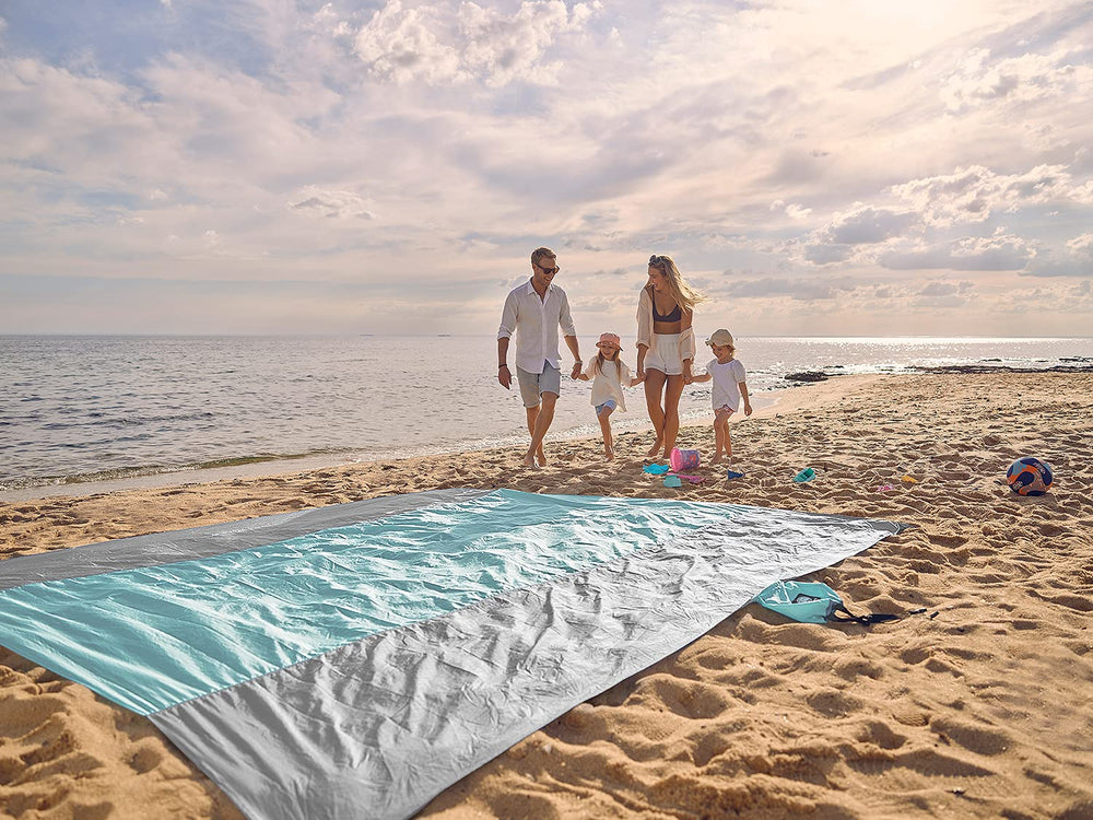 WEKAPO Beach Blanket grey used as a picnic blanket in outdoor setting