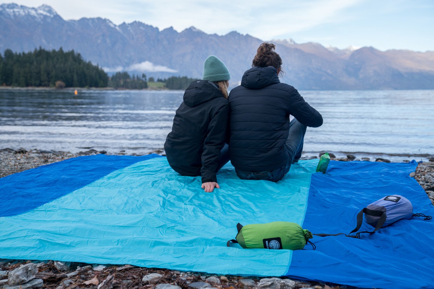 WEKAPO large blue blanket spread on sand for lounging