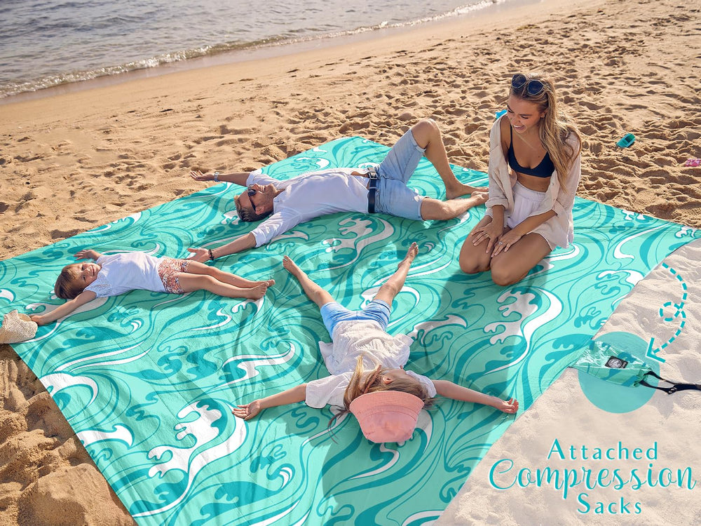 WEKAPO beach blanket stakes included stabilizes the blanket on windy beaches.