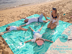 WEKAPO beach blanket stakes included stabilizes the blanket on windy beaches.