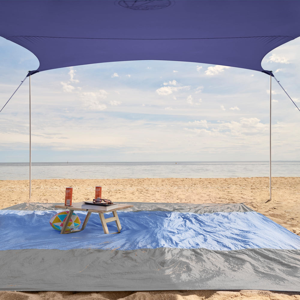 WEKAPO Beach Tent Sun Shelter premium, water-resistant fabric keeps you dry.