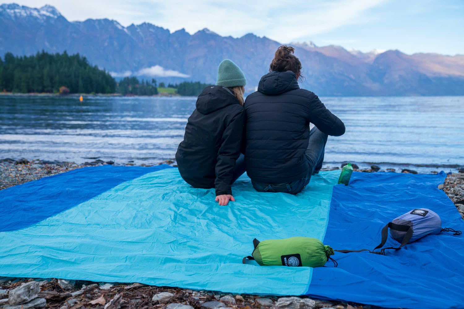 WEKAPO blanket used for camping and picnics in outdoor setting