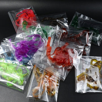 WellieSTR 6mm-wide fly tying elastic shown across a full color range.