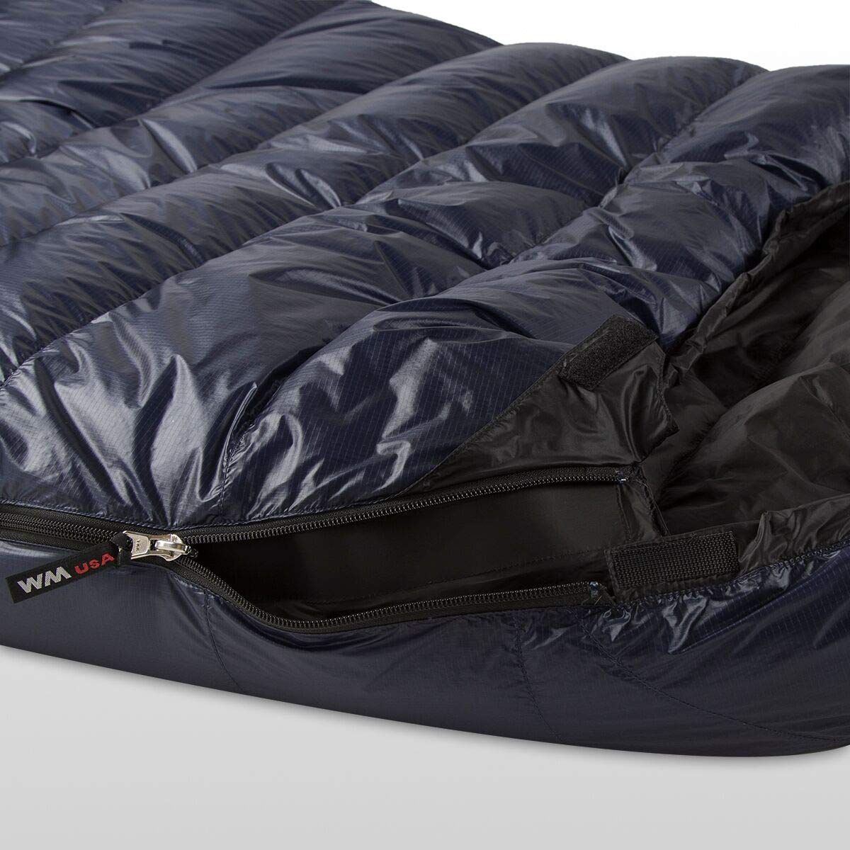 Western Mountaineering TerraLite compact 7x13 inch pack size for easy transport.