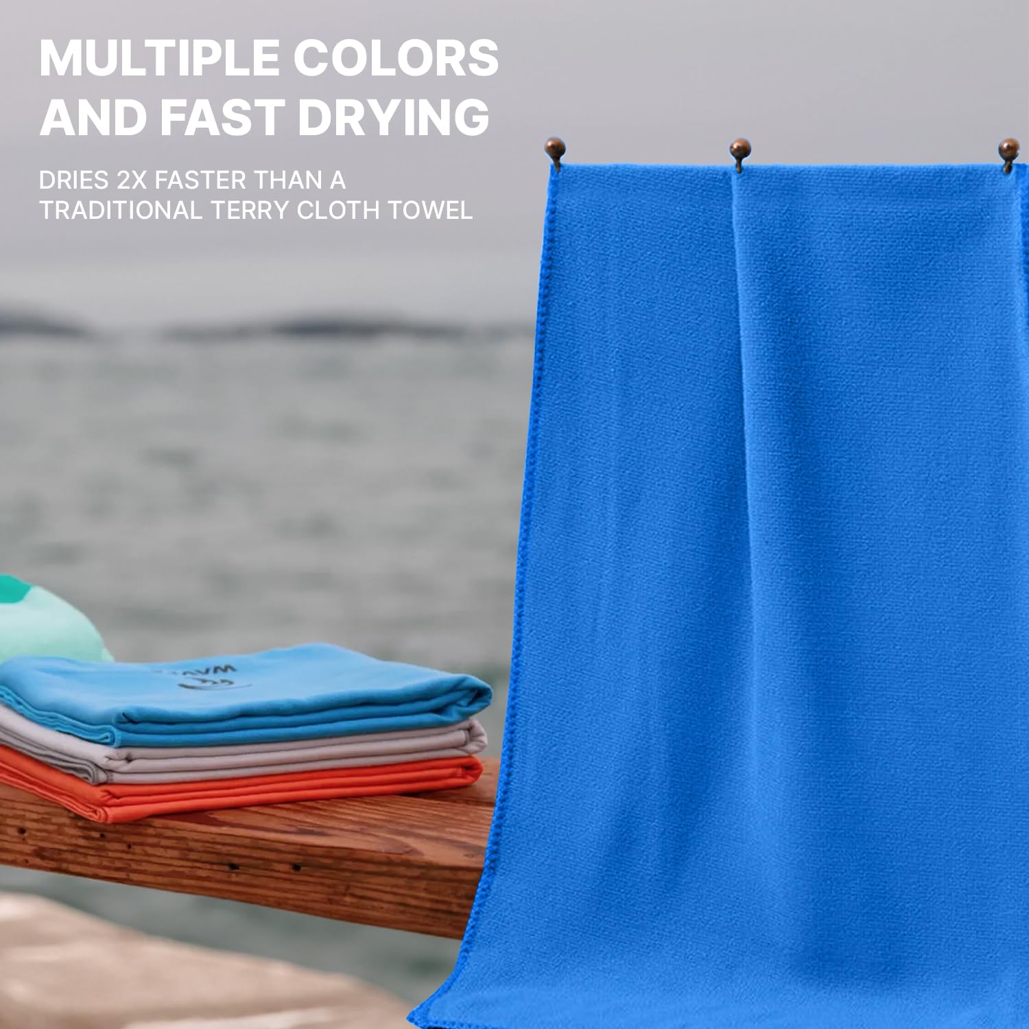 Wet Work towel on sand illustrates sand-removal capability at the beach.