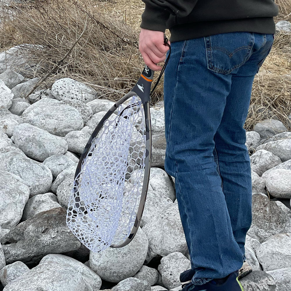 WETFLY floating carbon fiber fishing net on water with camo XD