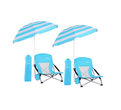 WGOS beach chair with tilted blue umbrella providing shaded comfort.