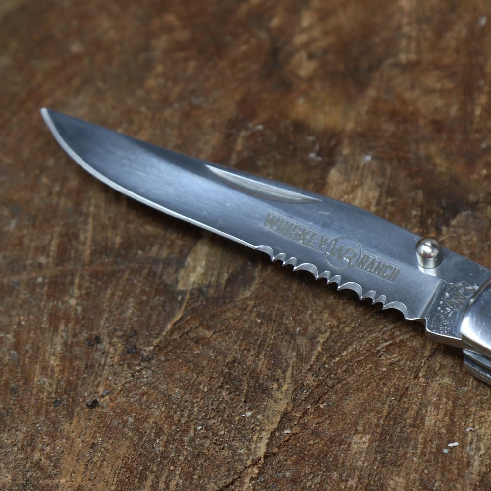 Whiskey Bent Hat Co. Acrylic handle offers a light, comfortable grip.
