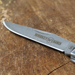 Gift-ready WHISKEY BENT HAT CO. Trapper knife in full-color box