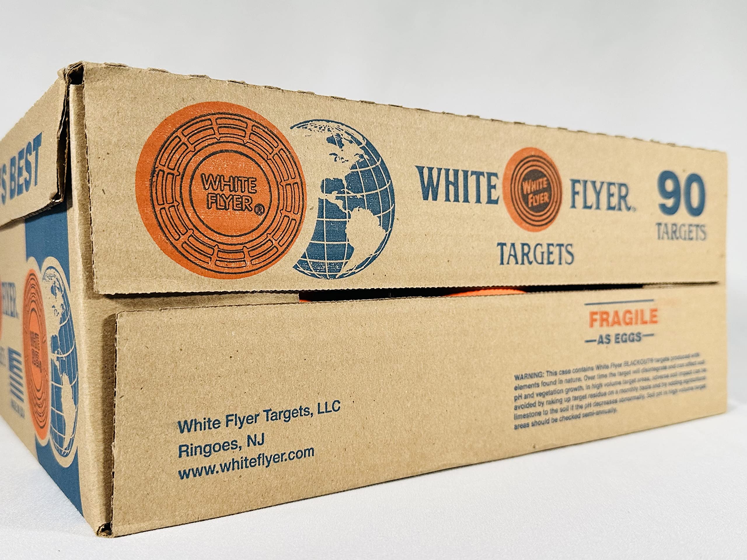 White Flyer outdoor-range targets in field setting for realistic trap practice